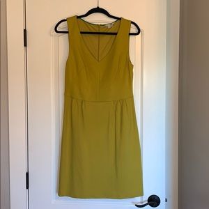 Chartreuse sleeveless v- neck shift dress.